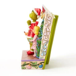 Enesco Jim Shore Grinch And Friends Light-Up Storybook Figurine, 6.2" 12 Enesco Jim Shore Grinch And Friends Light-Up Storybook Figurine, 6.2" -Enesco Store Grinch Max Cindy Lou Lighted Storybook Figurine 6017056 05
