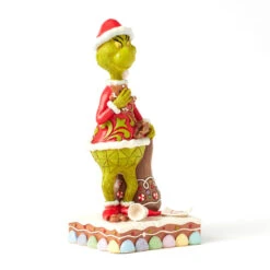 Enesco Jim Shore Grinch With Presents Eating Gingerbread Figurine, 8" -Enesco Store Jim Shore Grinch With Gifts and Gingerbread Figurine 6017058 03