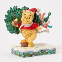 Enesco Jim Shore Disney Winnie The Pooh With Christmas Tree Figurine, 6.22" 10 Enesco Jim Shore Disney Winnie The Pooh With Christmas Tree Figurine, 6.22" -Enesco Store Jim Shore Pooh Carrying Christmas Tree Figurine 6016886 03