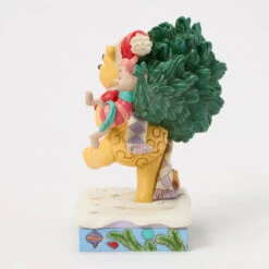 Enesco Jim Shore Disney Winnie The Pooh With Christmas Tree Figurine, 6.22" 12 Enesco Jim Shore Disney Winnie The Pooh With Christmas Tree Figurine, 6.22" -Enesco Store Jim Shore Pooh Carrying Christmas Tree Figurine 6016886 05