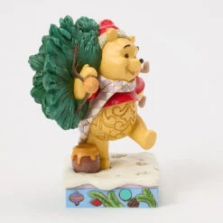 Enesco Jim Shore Disney Winnie The Pooh With Christmas Tree Figurine, 6.22" 13 Enesco Jim Shore Disney Winnie The Pooh With Christmas Tree Figurine, 6.22" -Enesco Store Jim Shore Pooh Carrying Christmas Tree Figurine 6016886 06