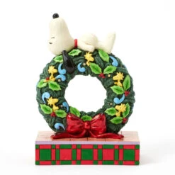 Enesco Jim Shore Peanuts Snoopy Sleeping On Light-Up Wreath Figurine, 7.13"