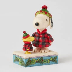 Enesco Jim Shore Peanuts Snoopy And Woodstock In Puffer Coats Figurine, 5.5" 10 Enesco Jim Shore Peanuts Snoopy And Woodstock In Puffer Coats Figurine, 5.5" -Enesco Store Snoopy and Woodstock in Plaid Puffer Coats Figurine 6017234 03